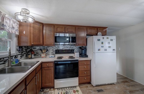 Menominee House | Upper Michigan Bay of Green Bay Beachfront Escape with Private Beach + Kayaks
