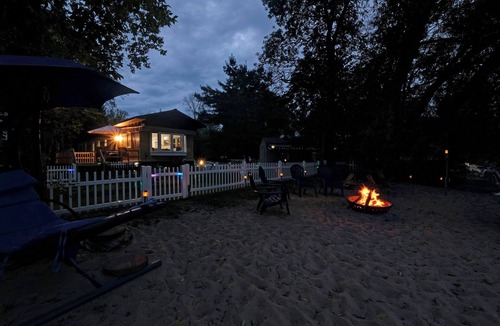 Menominee House | Upper Michigan Bay of Green Bay Beachfront Escape with Private Beach + Kayaks