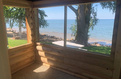 Port Hope Cottage | View glorious sunrises and sunsets from this cozy cabin right on Lake Huron! 🌅