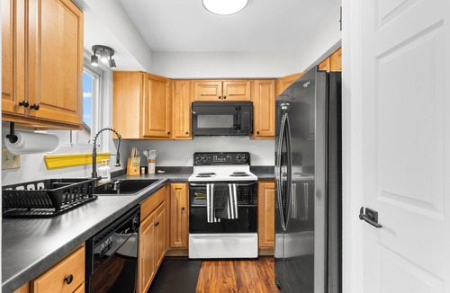 Maryland Heights House | Vivid Luxe Retreat: Luxury 2BR Townhouse