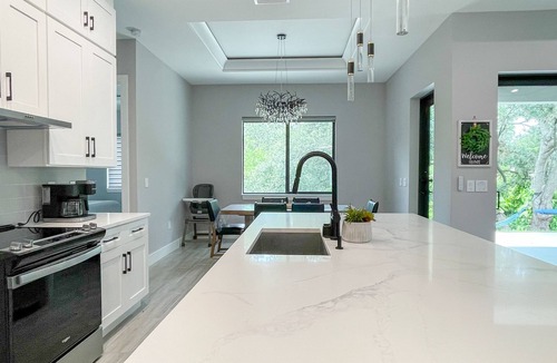 Warm Mineral Springs House | Warm mineral retreat mineral springs in backyard brand new spacious home