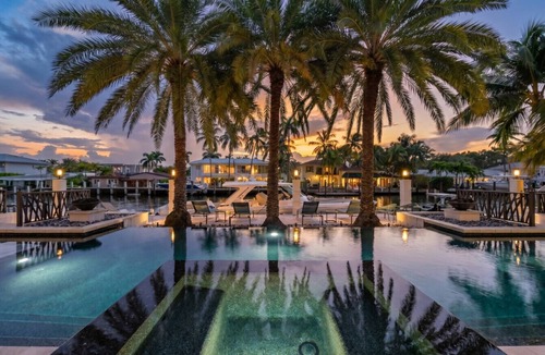 Las Olas Isles Villa | Waterfront 7BR Estate for 18 w/Infinity Pool, Spa, Private Dock, Wine Cellar
