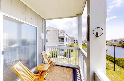 Carolina Yacht Landing Condo | Waterfront condo w/private balcony, shared pool, hot tub & A/C