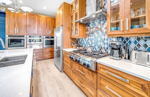 Coral Ridge Isles House | Waterfront Gem! HTD Pool+Hot Tub! 1 Mile To Beach!