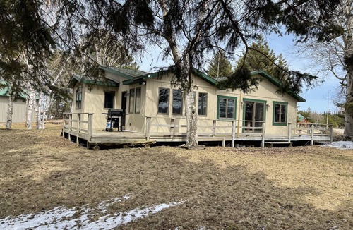Grand Marais House | Waterfront house with private dock and beach in Grand Marais, MI