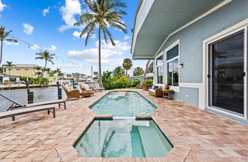 The Cove House | Waterfront Oasis Heated Pool Game Room Gym
