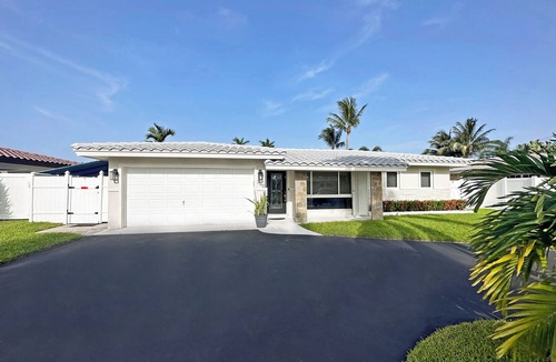 Garden Isles House | Waterfront Oasis – Private Heated Pool & Waterfall Hot Tub