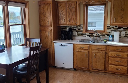 Algoma House | Waterfront, Serene 4-Bedroom House on Ahnapee River with Boat Dock/Slip