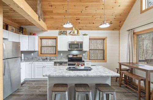 Tellico Plains Cabin | Welcome to the Compass Lodge with HotTub! Sit back and relax in this calm, stylish space.