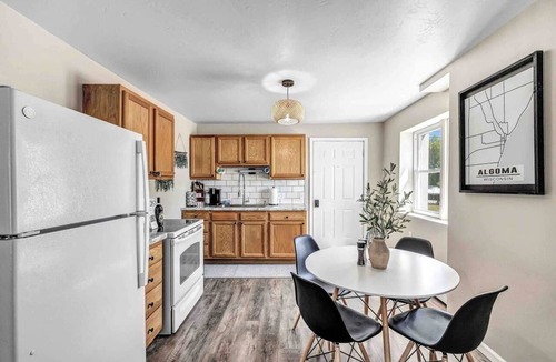 Algoma Apartment | Welcome to The Steele Magnolia! Completely renovated 2 bed/1ba plus bonus pull out futon couch. We are located directly across the street from Von Stiehl Winery and are just a few minutes walk to Crescent Beach!