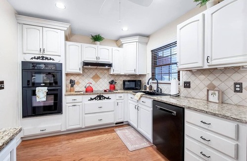 Wichita House | West-Side Ruby: Hot Tub, King Beds, Arcade, Pool Table