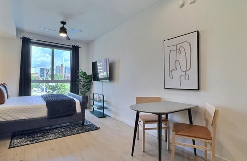 Five Points South Apartment | Work Trip Escape Near Hospital and Local Dining