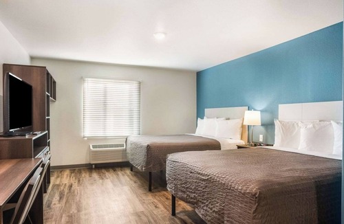 Newnan Hotel | You Can Save In 2 Affordable Suites w/Kitchen | Good For Friends & Family