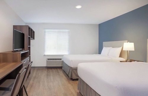 Newnan Hotel | You Can Save In 2 Affordable Suites w/Kitchen | Good For Friends & Family
