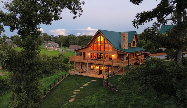 6 Bedroom Waterfront Log Home with EV charging!