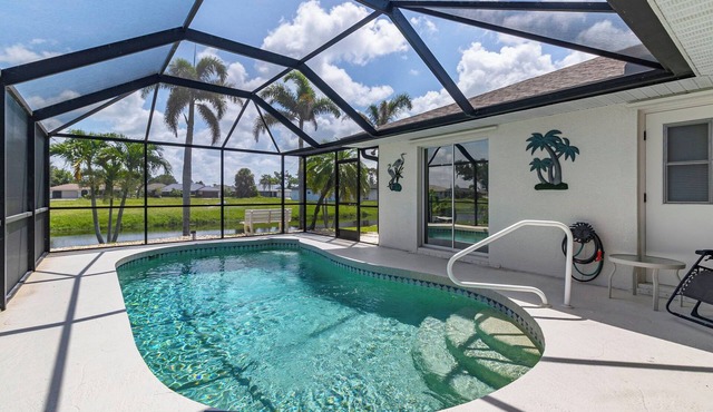 Airy Canal-Front 3BR Home with Heated Pool Minutes to Beaches, Golf & Southwest Florida Adventures