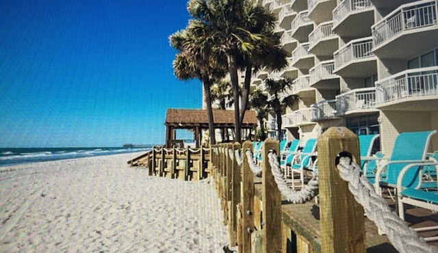 Beautiful oceanfront Condo with direct access to the beach, steps from the sand.
