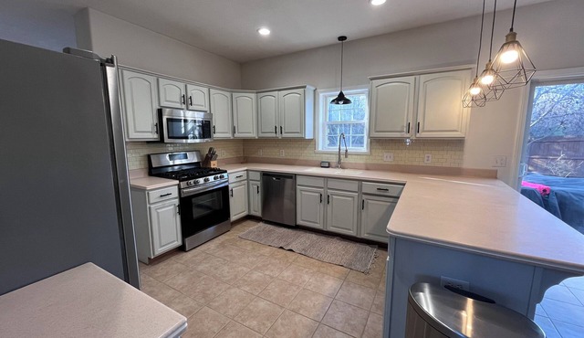 Conveniently located home w/private backyard!