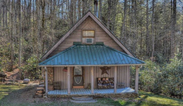 Discover tranquility at Creekside Waterfalls, a cozy 1-bedroom cabin in Fleetwood, NC.