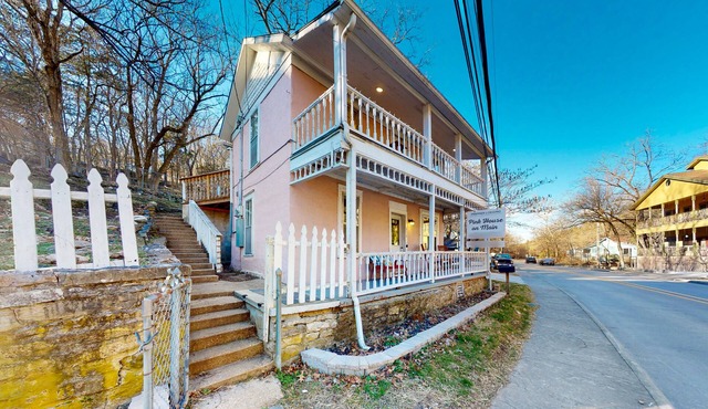 Dog-friendly home with a porch, washer/dryer, balcony, & updated appliances