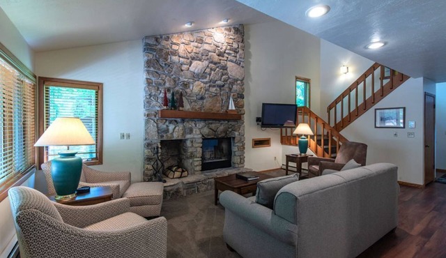 Elegant 2BR Condo with Lake View, Balcony, and Sauna