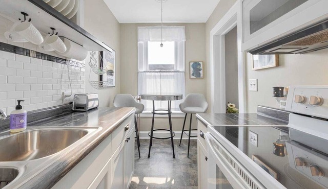 Experience a refined retreat at this elegant apartment situated in the vibrant center of downtown Two Harbors, Minnesota.