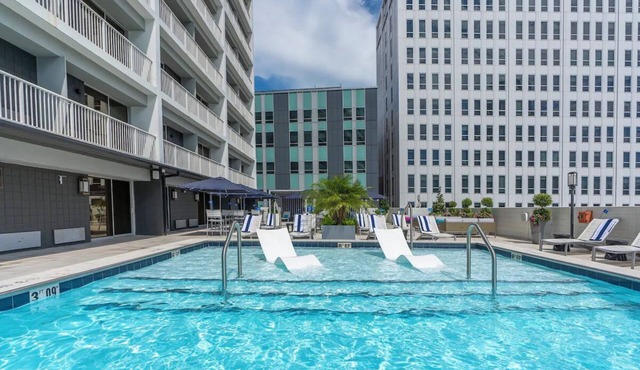 Experience City Views & Rooftop Pool – Steps from French Quarter & Bourbon St