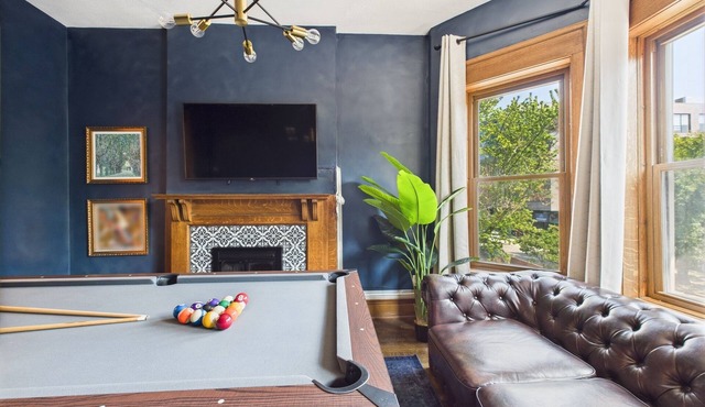 Expertly designed 9BR Art Deco manor with garage included.
