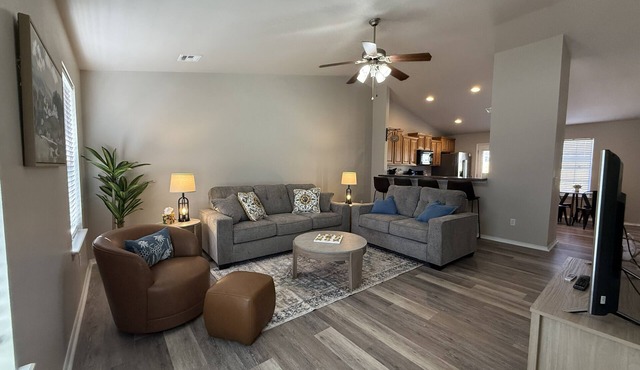 Family-friendly 3BR with a fun 90s themed game room, fenced yard & grill