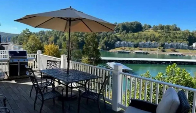 LAKEFRONT Deerfield condo on Norris FIRST ROW steps to covered boat slip & pool