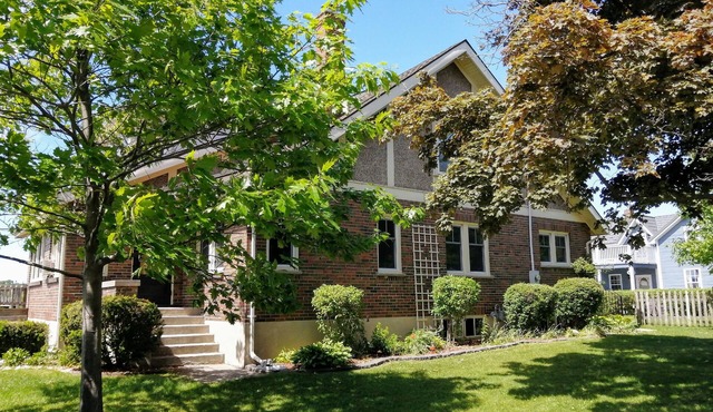 Large Summer House with the stunning views, four bedrooms, deck and hot tub! in Goderich