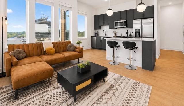Luxury Palmer Parkside Condo w/Regions Field View