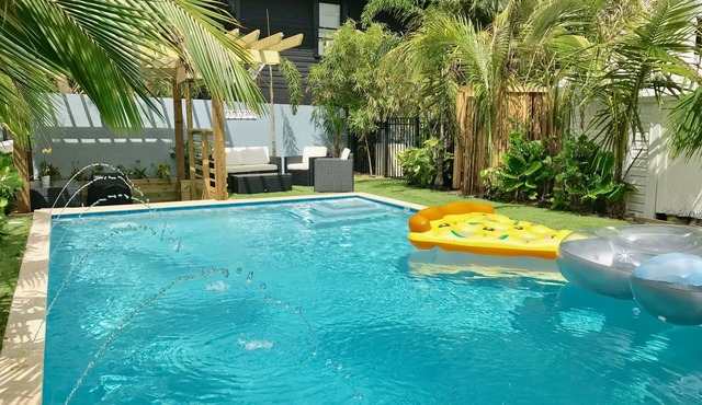 Modern Bungalow w/ Heated Pool, Patio, Bar, and Grill! (A)