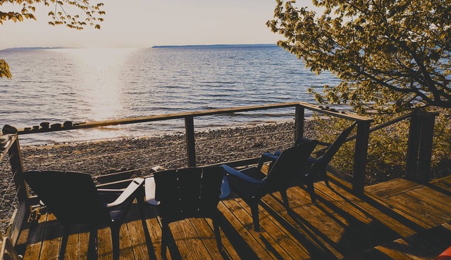 NEW! Waterfront Cottage on private Lake Michigan Beach with glorious sunsets