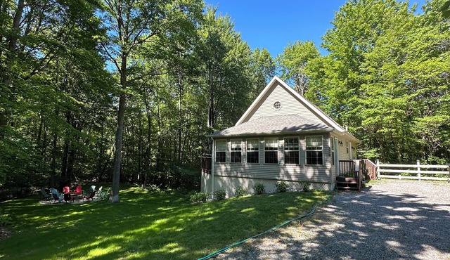 Privacy and Luxury await! Fire Pit Patio, Large Outdoor Deck, and Heated Pool.