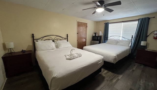 Queen Guest Room located at the Joplin Inn at the entrance to Mountain Harbor, just 2 1/2 miles from Lake Ouachita. by RedAwning