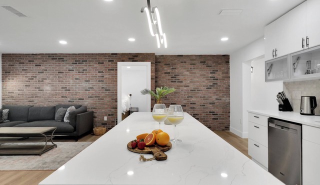 Sarasota escape awaits- a 4-bedroom, 2-bathroom home featuring a brand-new pool.