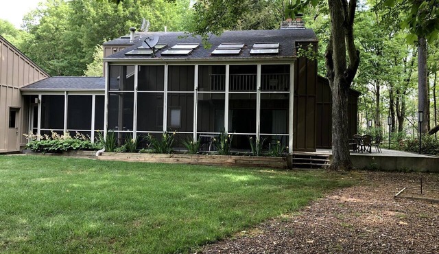 Secluded Woodland Retreat Home with Creekside Deck Near Macatawa Beach in Macatawa, Michigan