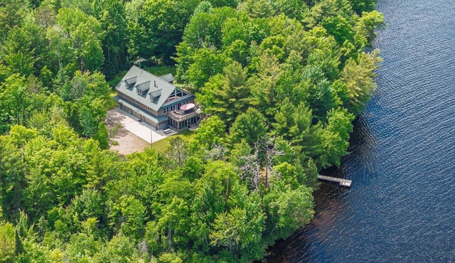 Spacious Lakefront Retreat with Dock & Canoes