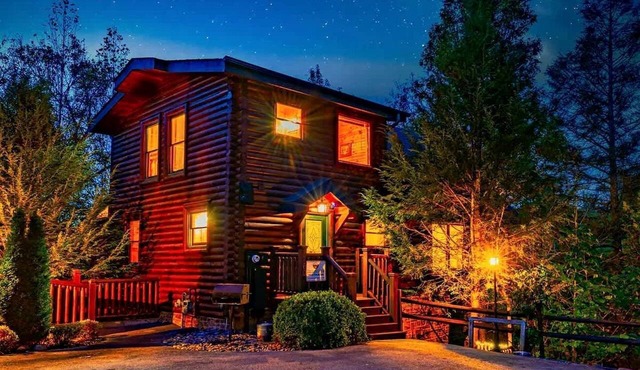 Stunning Log Cabin with Movie Theatre & Hot Tub near Arts and Crafts District in Gatlinburg, TN