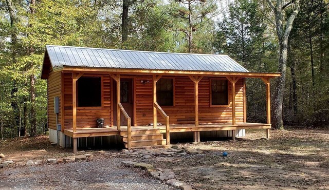 Stunning Riverfront Log Cabin Nestled Amidst Trees in Nashoba, Oklahoma