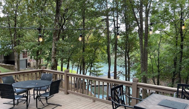 Waterfront. Private, covered, boat dock. Large living spaces inside and out.
